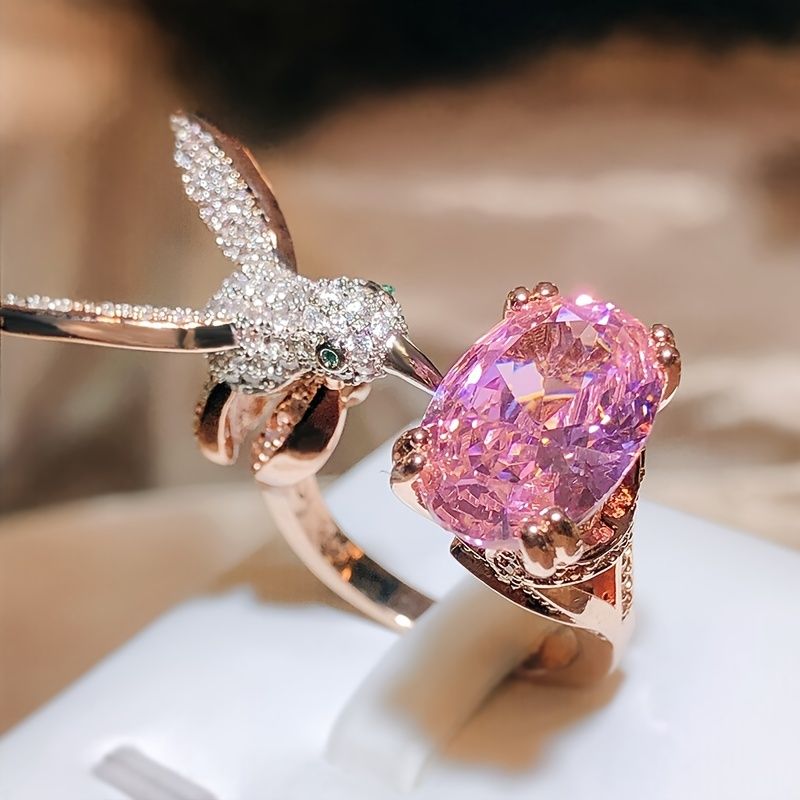 Pink Zircon Hummingbird Ring
925 sterling silver open ring with a sparkling pink zircon and delicate hummingbird design. Elegant and eye-catching.
