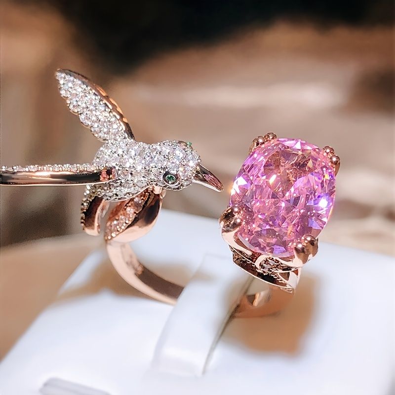 Pink Zircon Hummingbird Ring
925 sterling silver open ring with a sparkling pink zircon and delicate hummingbird design. Elegant and eye-catching.
