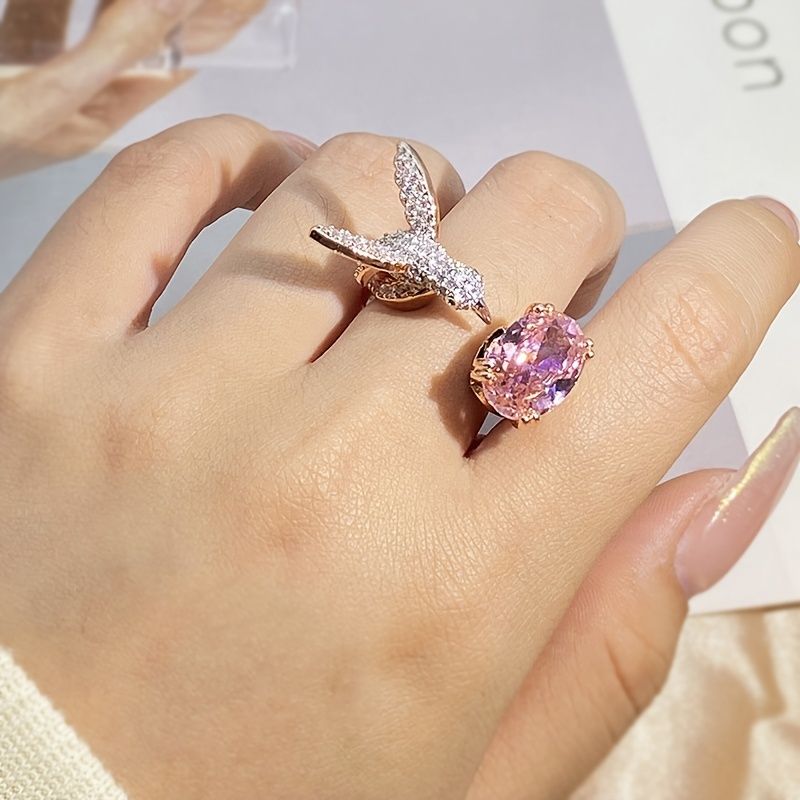 Pink Zircon Hummingbird Ring
925 sterling silver open ring with a sparkling pink zircon and delicate hummingbird design. Elegant and eye-catching.